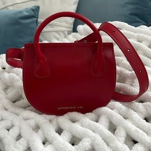 Red belt bag! The size is small - medium, the belt is adjustable.